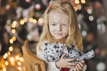 Beautiful child in anticipation of the new year.