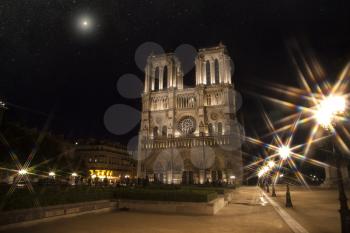 Notre Dame at night. Paris under the light of stars