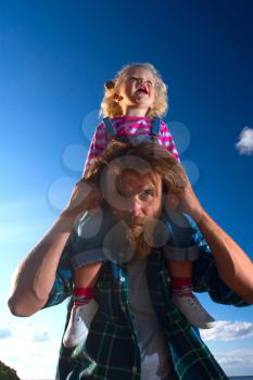 Dad and daughter at the sea walk by the sea. Family