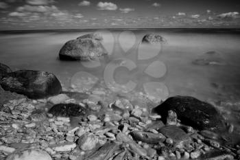 rocks in the sea. black-and-white photos on a large exposure. infrared photography