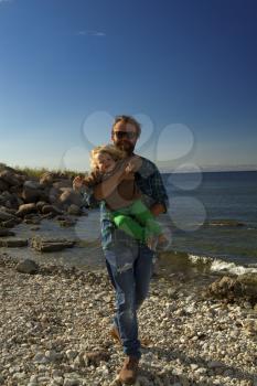 Dad and daughter at the sea . vacation by the ocean