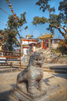 Swayambhunath - the Buddhist temple and the village center on the outskirts of Kathmandu in Nepal. Monkey Temple.