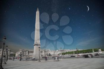 Place de la Concorde in Paris,France. At night the stars shine and the moon.