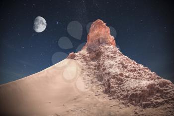 Valle de la Luna (Moon Valley) close to San Pedro de Atacama, Chile. night shining stars.