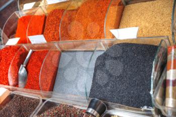 Spices lies on the counter in the market