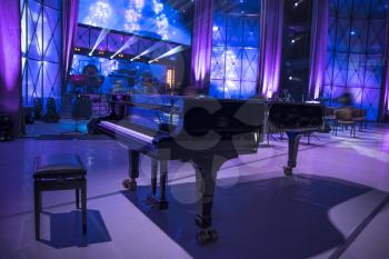 grand piano on the stage before the performance