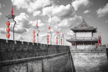 Xian city wall. The largest monument of Chinese architecture. black and red and white photo