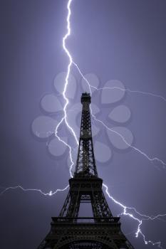 Powerful lightning strike. Eiffel tower , Paris, France