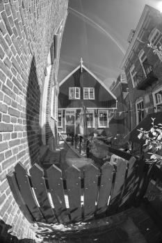 black and white photography. Traditional houses in Holland town Volendam, Netherlands