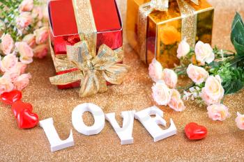 Valentine's day concept with gift box and letters love