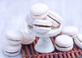 sweet macaroons on the white table, fresh macaroon cookies