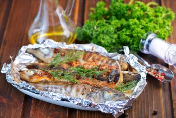 baked fish with spice in the foil