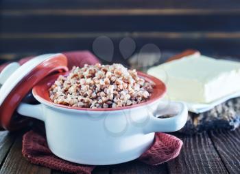 buckwheat with butter on the wooden table