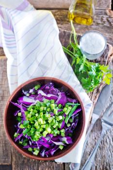 salad in bowl and on a table