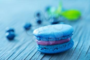 blueberry macaroon and berries on a table