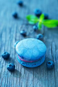 blueberry macaroon and berries on a table