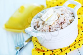 boiled porridge with butter in the bowl