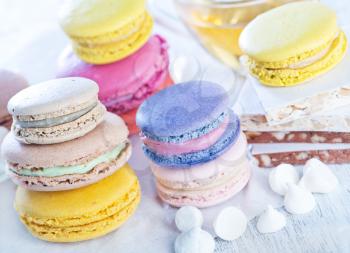 color sweet cookies, macaroons on the white table