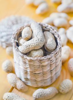 nuts in basket and on a table