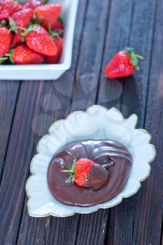 strawberry with chocolate on the plate