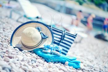 summer background, blue towel on sea beach