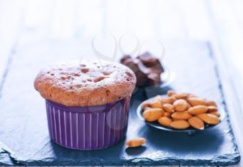 muffins with chocolate and almond on a table