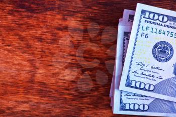 dollars on the wooden table, dollar background