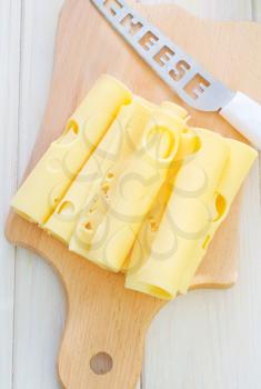 cheese on wooden board