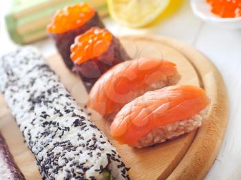 Fresh rolls and sushi with salmon
