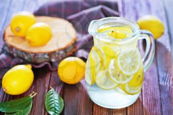 fresh lemonad in the jug and on a table