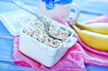 oat flakes with banana in the bowl