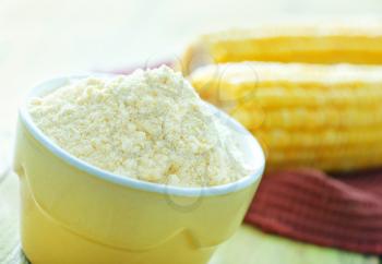 corn flour in bowl and on a table