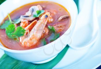 tom yam soup in the white bowl