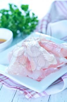 raw fish and spice on a table