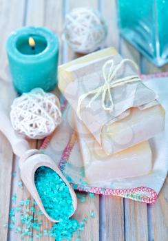 sea salt and soap on the wooden table