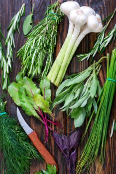 aroma herb and garlic on the wooden table