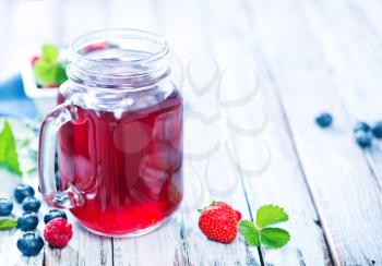 berry compot in glass and on a table