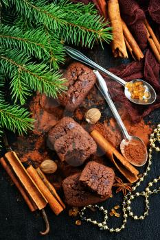 chocolate cake with spice on christmas background