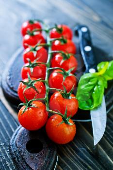 fresh tomato, cherry tomato on a table