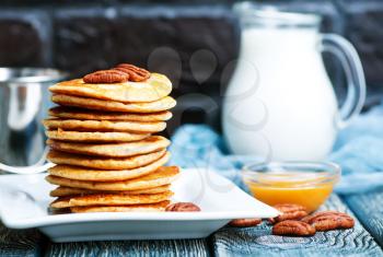 pancakes on plate and on a table