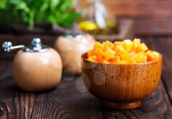 raw pumpkin in bowl,fresh cubes from pumpkin