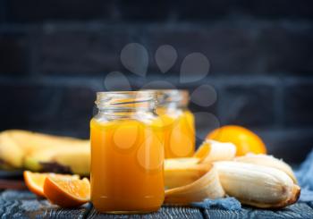 juice from banana and orange on a table