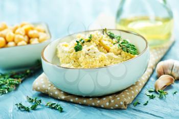 humus in bowl and on a table