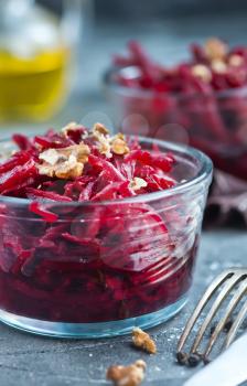 beet salad in bowl and on a table
