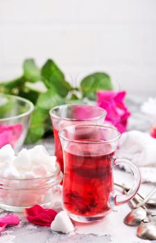 tea with rose on a table, stock photo