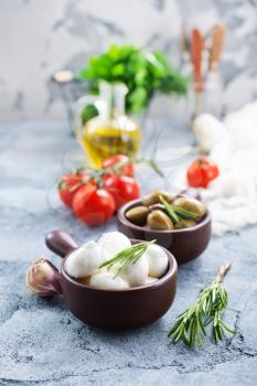 ingredients for caprese salad on a table