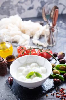 fresh ingredients for caprese salad on a table