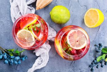 lemonad with raspberry on a table, stock photo