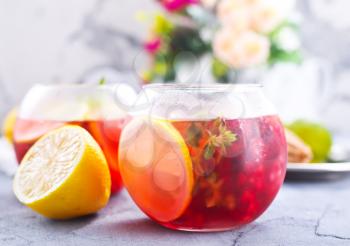 lemonad with raspberry on a table, stock photo