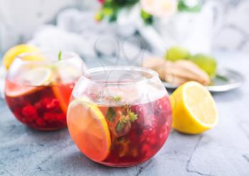 lemonad with raspberry on a table, stock photo